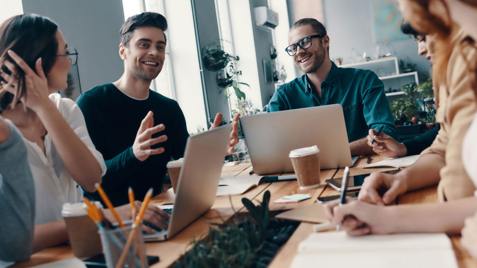 Revenue-team-at-a-conference-table